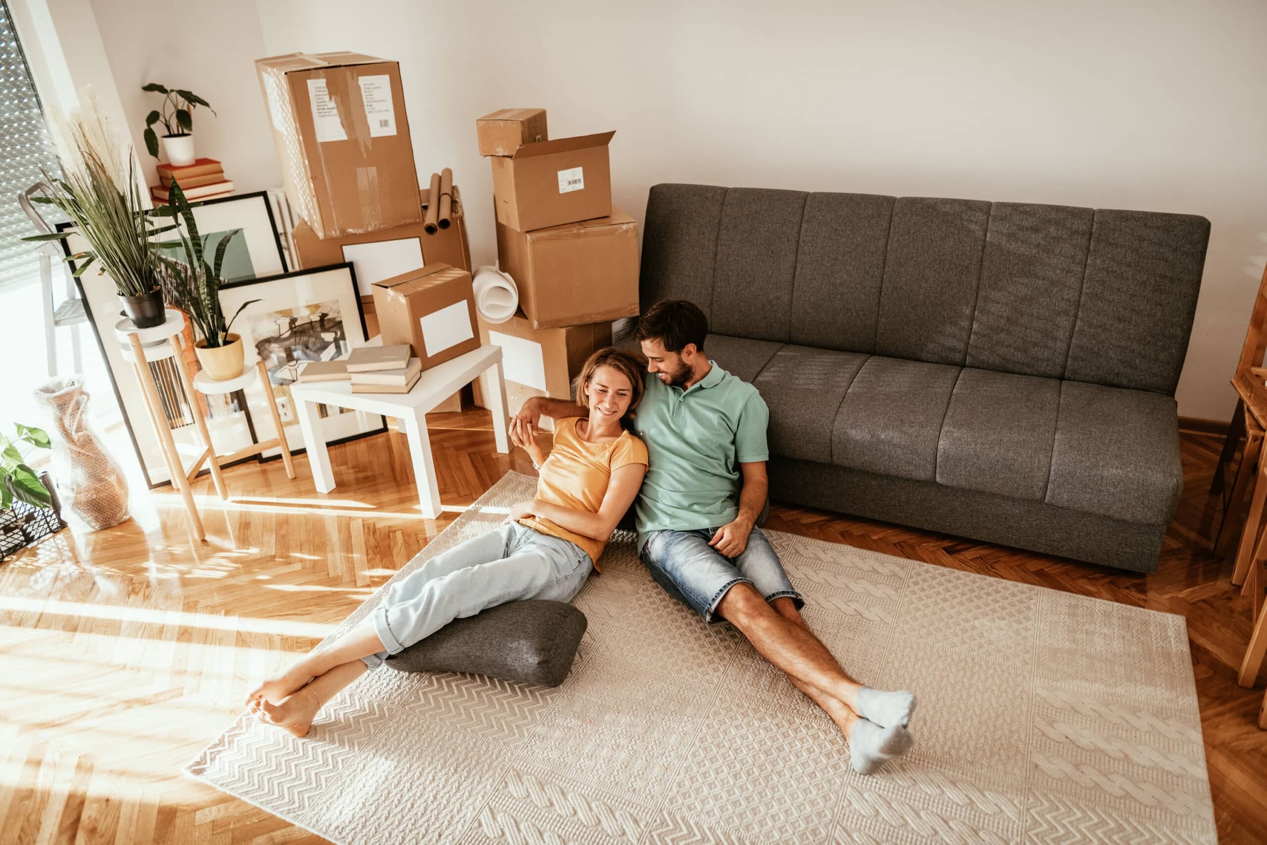 a couple with moving boxes